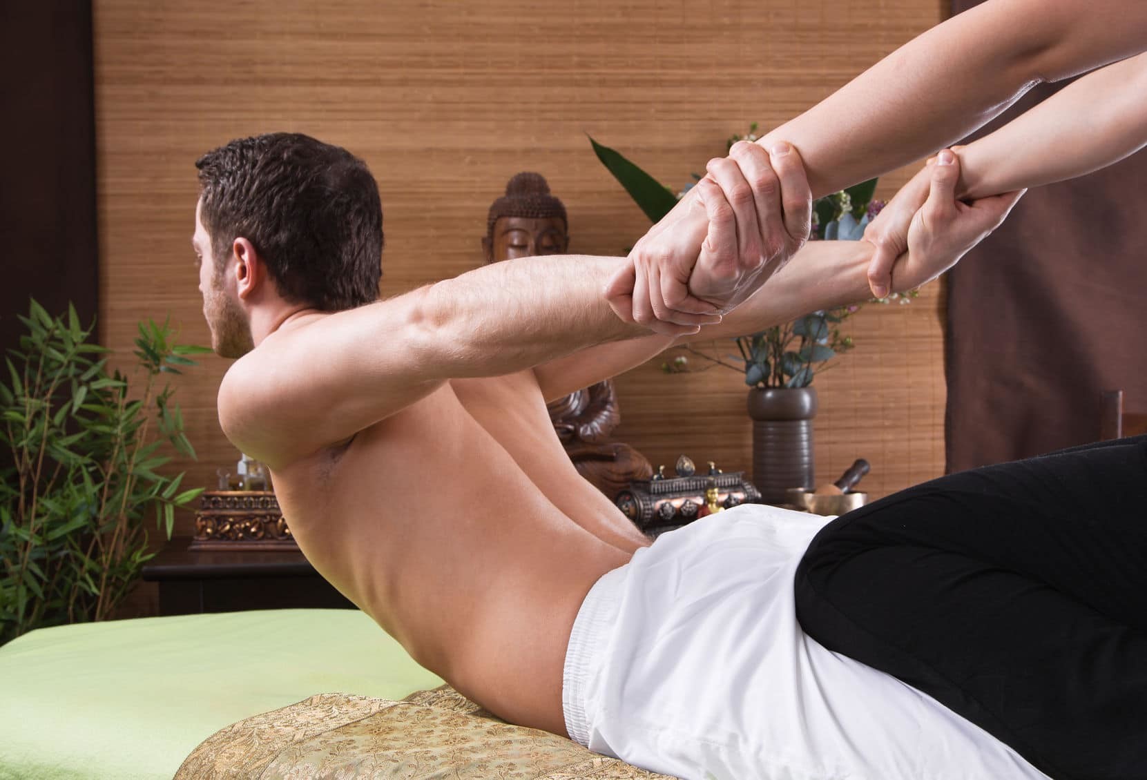 Traditional Thai massage stretching technique